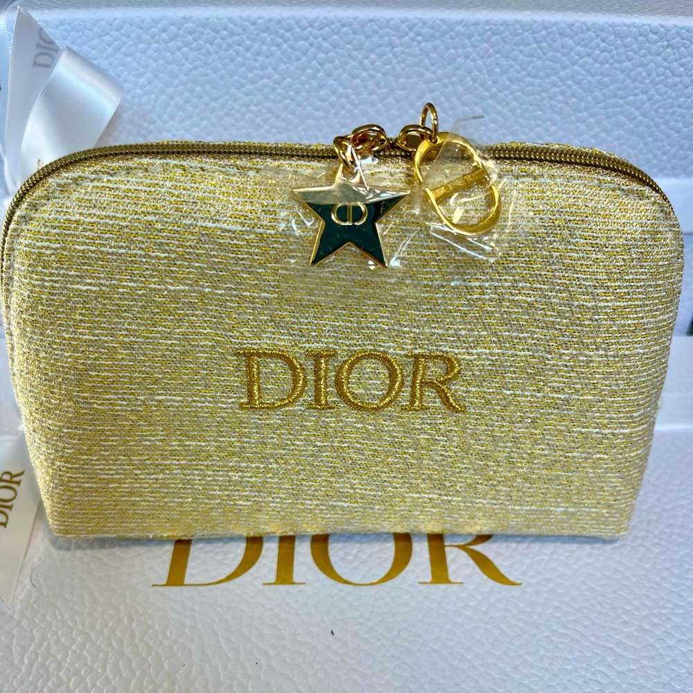 NWOT Dior beauty gold tone pouch with charms